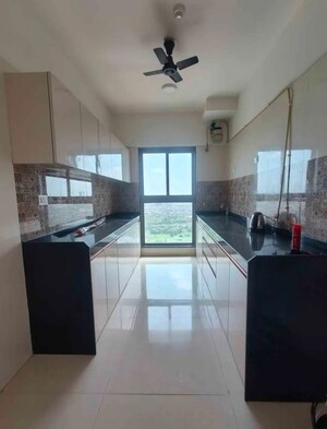 Kitchen in 2 BHK Apartment at Raj Infinia, Malad West – for Sale