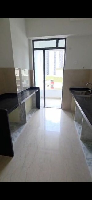 Kitchen in 2 BHK Apartment at Narang Vivenda, Malad West – for Sale