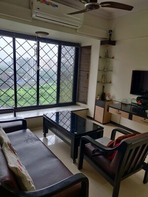Living Room in 1 BHK Apartment at Manavsthal Heights, Andheri East – for Rent
