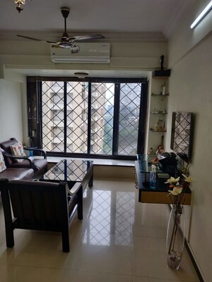 Living Room in 1 BHK Apartment at Manavsthal Heights, Andheri East – for Rent