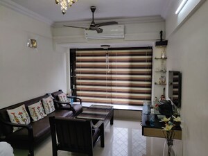 Living Room in 1 BHK Apartment at Manavsthal Heights, Andheri East – for Rent