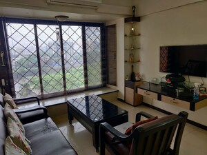 Living Room in 1 BHK Apartment at Manavsthal Heights, Andheri East – for Rent
