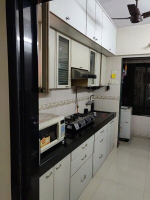 Kitchen in 1 BHK Apartment at Manavsthal Heights, Andheri East – for Rent