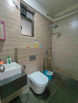 Bathroom in 3 BHK Apartment at Rajesh Raj Infinia, Malad West – for Rent