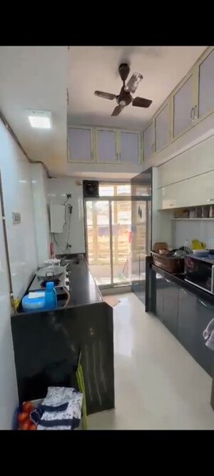 Kitchen in 2 BHK Apartment at Poonam Tower CHS Ltd, Mira Road – for Sale