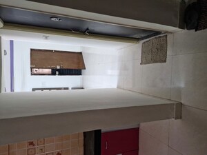 Kitchen in 2 BHK Apartment at Omkar Vanashree, Hadapsar – for Rent