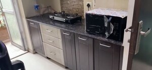 Kitchen in 2.5 BHK Apartment at Prateek Wisteria, Sector 77 – for Rent