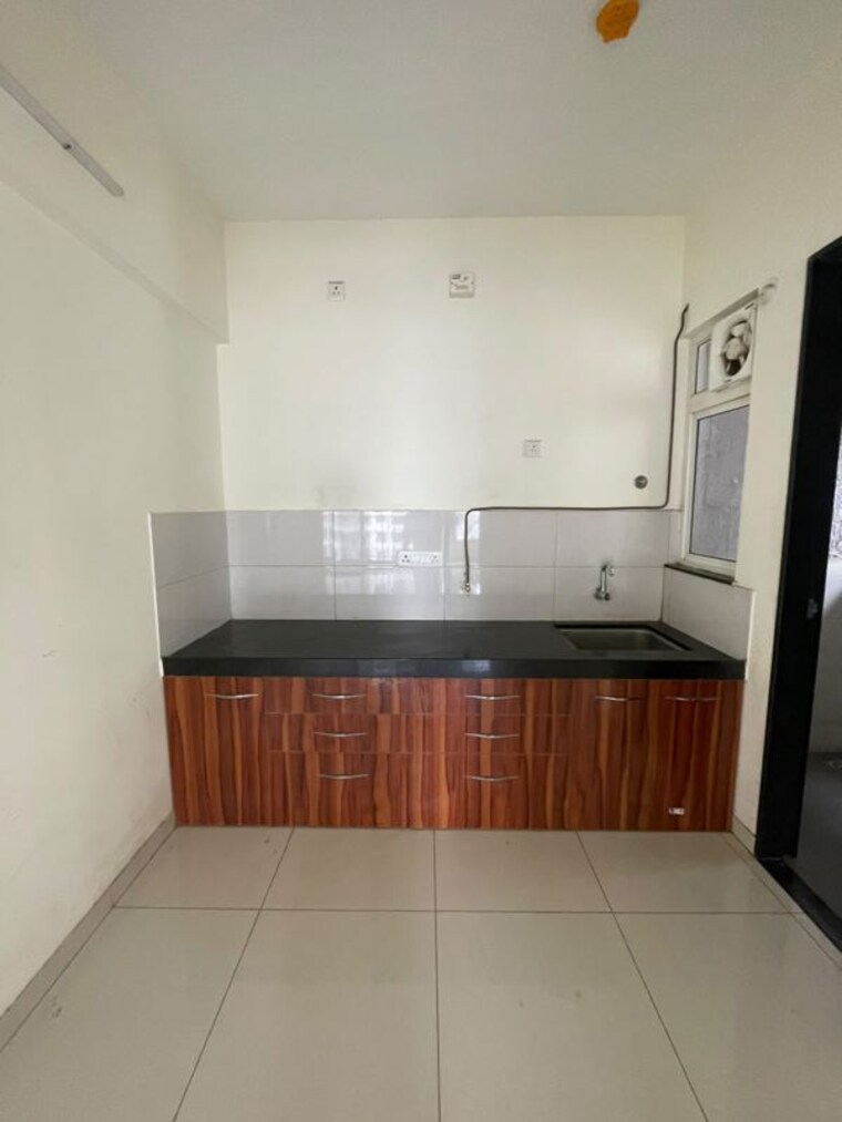 Kitchen, kolte-patil-life-republic-universe 2 Bedroom 630 Sq.Ft. Apartment In Hinjewadi Pune 10471475