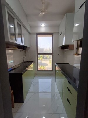 Kitchen in 1 BHK Apartment at Raymond Realty Phase II, Swastik Garden – for Rent