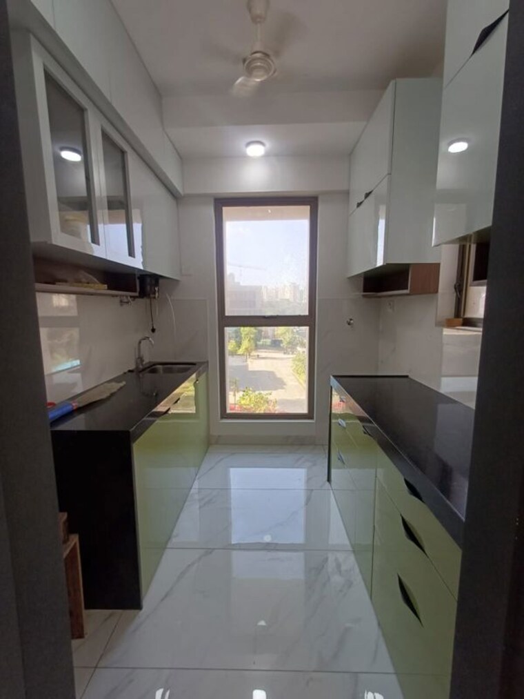 Kitchen, raymond-realty-phase-ii 1 Bedroom 425 Sq.Ft. Apartment In Swastik Garden Thane 10471587