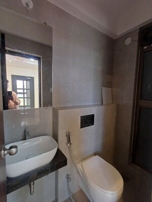Bathroom in 1 BHK Apartment at Raymond Realty Phase II, Swastik Garden – for Rent