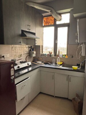 Kitchen in 1 BHK Apartment at Auric City Homes, Sector 82 – for Sale