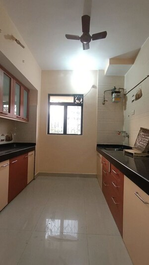 Kitchen in 1 BHK Apartment at Cosmos Heritage, Manpada – for Rent