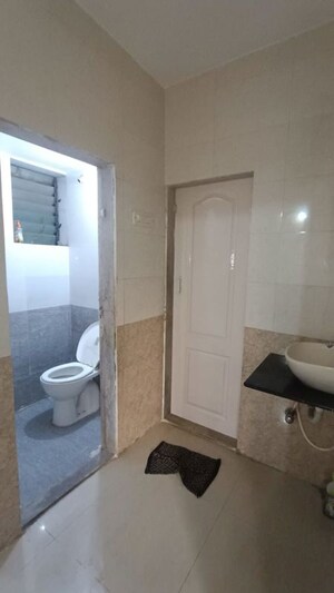 Bathroom in 1 BHK Apartment at Cosmos Heritage, Manpada – for Rent