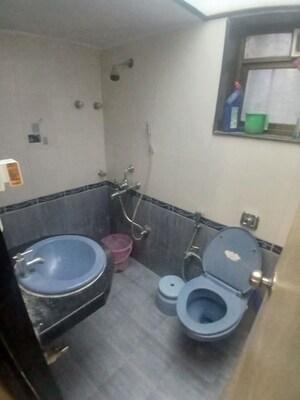 Bathroom in 1 BHK Apartment at Laxmi Chandra Niwas, Charni Road – for Rent