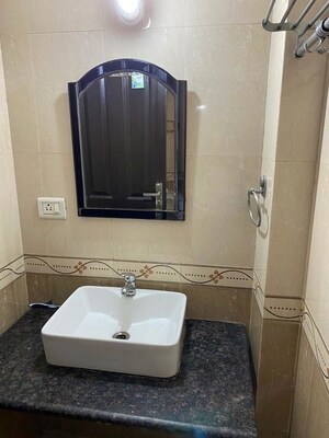 Bathroom in 4 BHK Apartment at Dwarka – for Rent