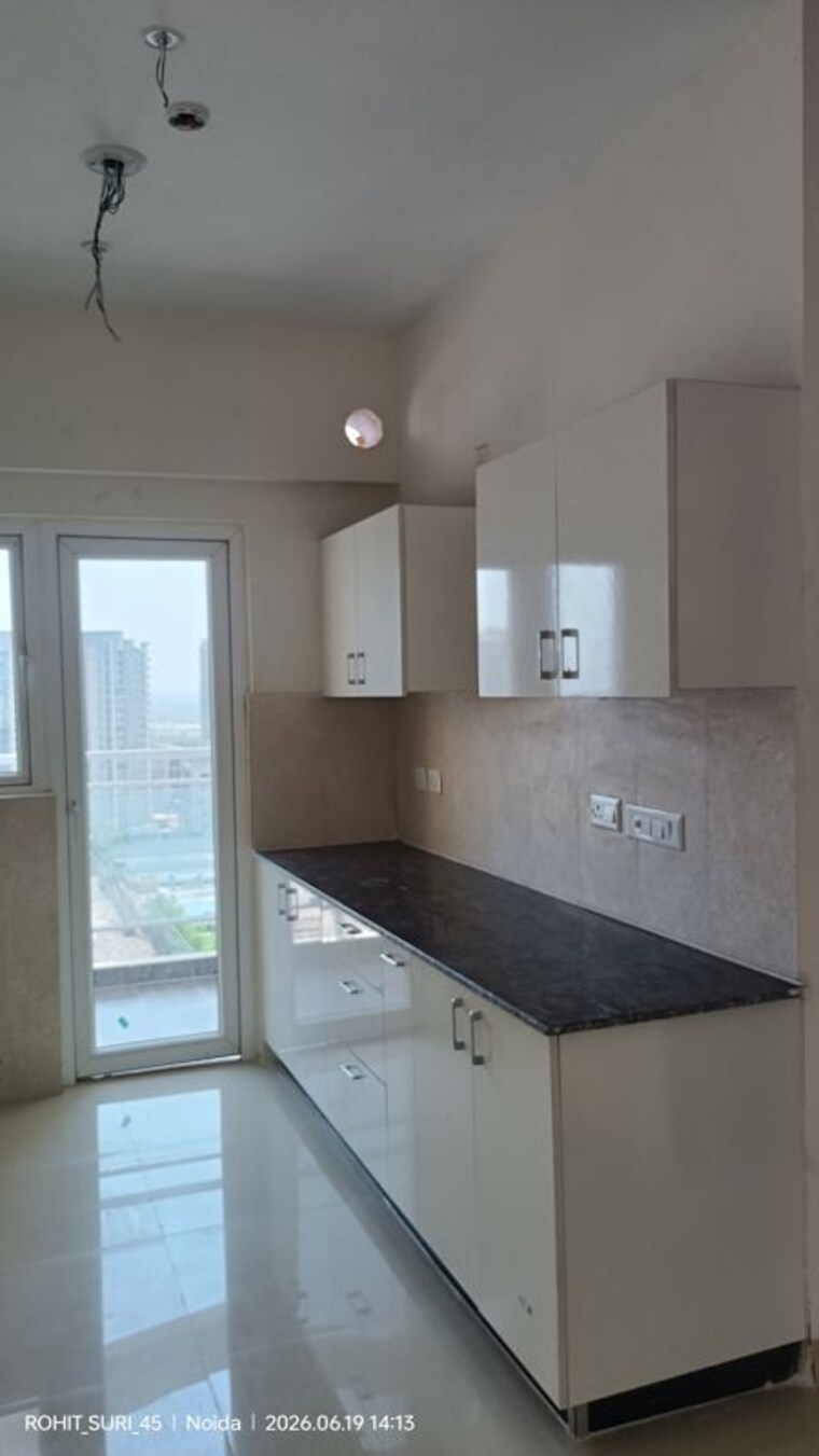 Kitchen, samridhi-luxuriya-avenue 2.5 Bedroom 1165 Sq.Ft. Apartment In Sector 150 Noida 10471825