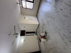 Bathroom in 3 BHK Apartment at Krishna Apra Residency, Sector 61 – for Sale