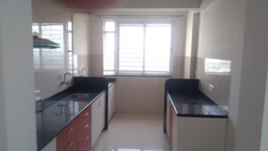 Kitchen in 3 BHK Apartment at B K Pate Dahanukar Regency, Kothrud – for Rent
