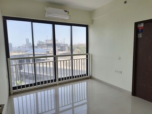 Room in 2 BHK Apartment at Dynamix Divum, Malad East – for Rent