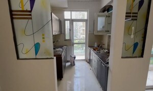 Kitchen in 3 BHK Apartment at Prateek Wisteria, Sector 77 – for Rent