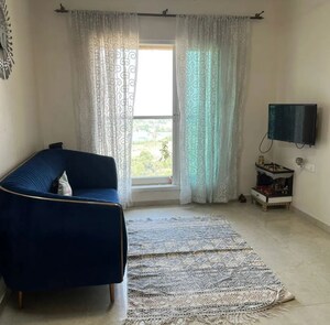 Living Room in 2 BHK Apartment at Dosti West County, Balkum Pada – for Rent