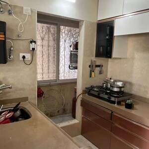Kitchen in 2 BHK Apartment at Dosti West County, Balkum Pada – for Rent