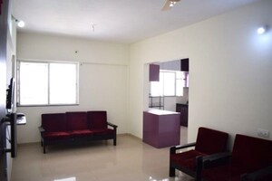 Living Room in 2 BHK Apartment at Jalan Aura County Pune, Wagholi – for Rent