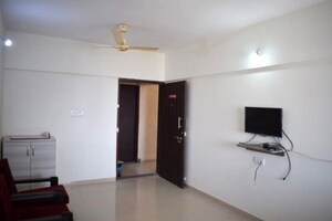 Living Room in 2 BHK Apartment at Jalan Aura County Pune, Wagholi – for Rent