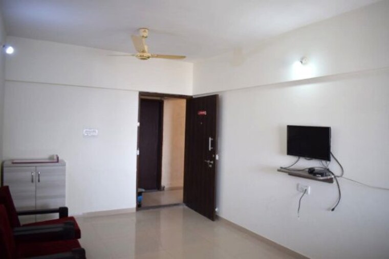 Living Room, jalan-aura-county-pune 2 Bedroom 1078 Sq.Ft. Apartment In Wagholi Pune 10472000