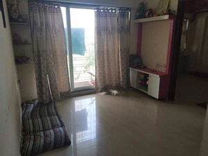 Living Room in 1 BHK Apartment at Spring Grove Uno Society, Kandivali East – for Rent