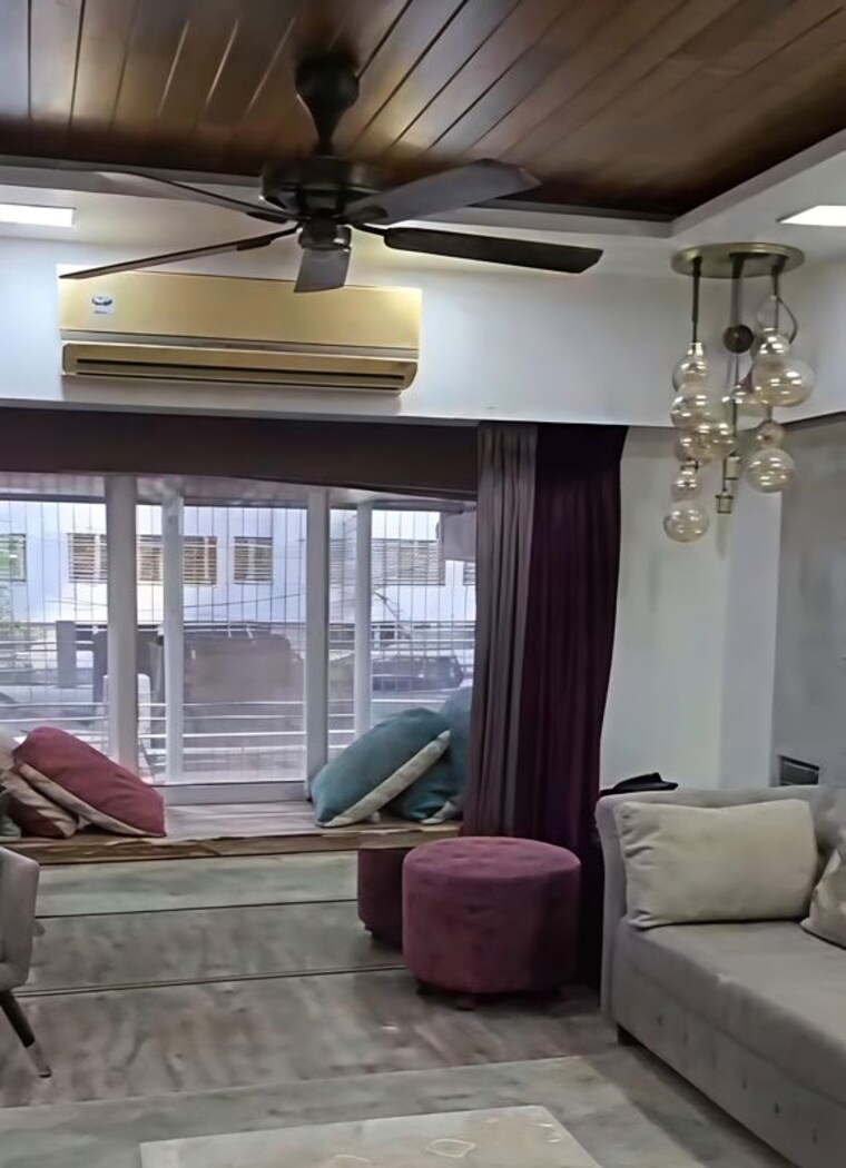Living Room, ajmera-beverly-hills-and-royal-empire 4 Bedroom 1800 Sq.Ft. Apartment In Andheri West Mumbai 10472113