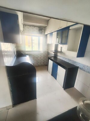Kitchen in 2 BHK Apartment at Himgiri Lokupvan Phase II CHS Ltd, Vasant Vihar – for Sale