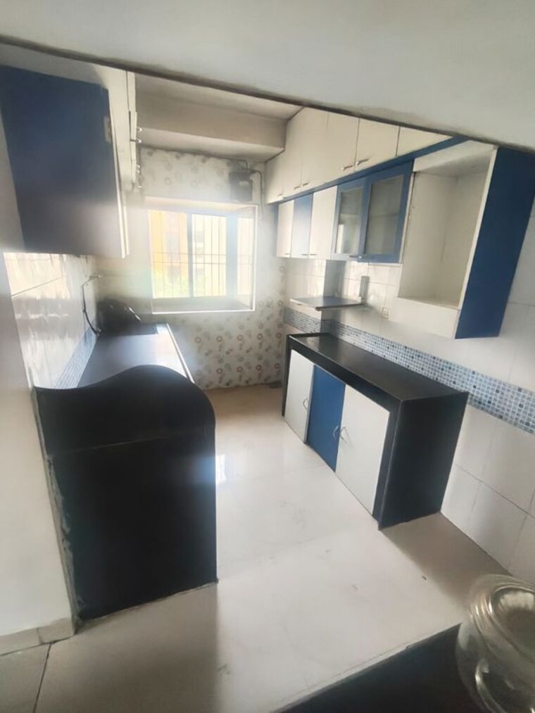 Kitchen, himgiri-lokupvan-phase-ii-chs-ltd 2 Bedroom 700 Sq.Ft. Apartment In Vasant Vihar Thane 10472185