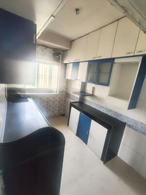Kitchen in 2 BHK Apartment at Himgiri Lokupvan Phase II CHS Ltd, Vasant Vihar – for Sale