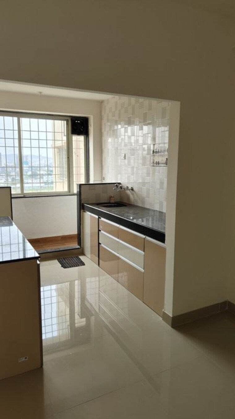 Kitchen, eden-garden-tathawade 2 Bedroom 1400 Sq.Ft. Apartment In Tathawade Pune 10472182
