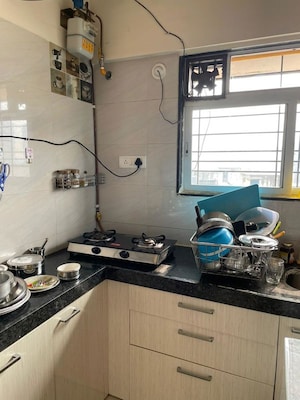 Kitchen in 2 BHK Apartment at Neptune CHS Andheri West, Andheri West – for Rent