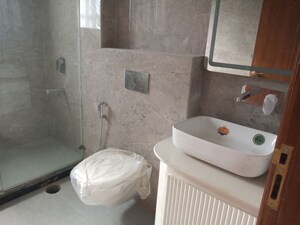 Bathroom in 4 BHK Builder Floor at Sector 85 – for Sale