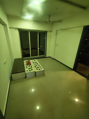 Living Room in 2 BHK Apartment at Sudarshan Sky Garden, Ghodbunder Road – for Sale