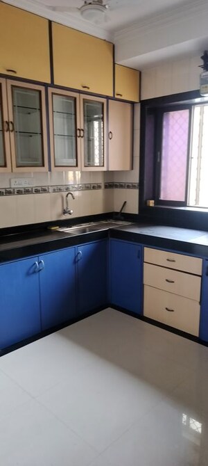 Kitchen in 2 BHK Apartment at Mangal Geeta Apartment, Andheri West – for Rent