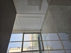 Living Room in Studio Apartment at M3M Corner Walk, Sector 74 – for Rent