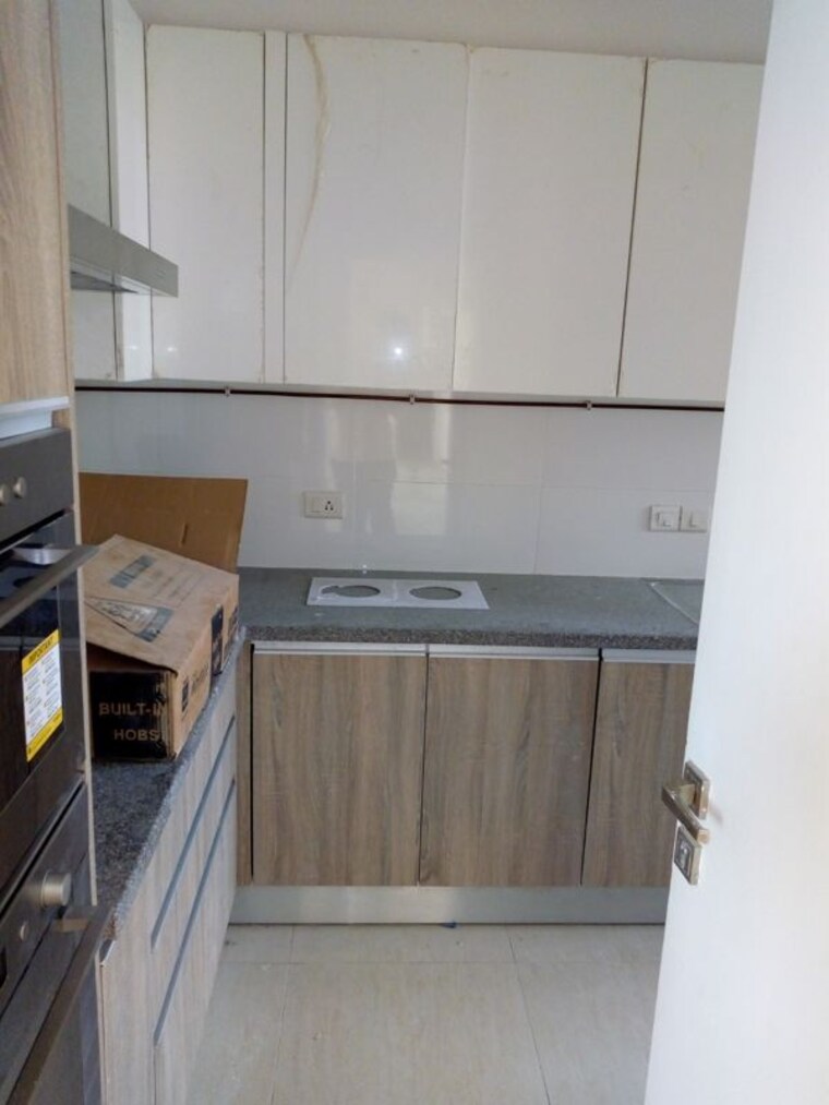 Kitchen, dlf-the-primus 3.5 Bedroom 2029 Sq.Ft. Apartment In Sector 82a Gurgaon 10472313