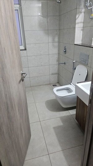 Bathroom in 3.5 BHK Apartment at Emaar Palm Gardens, Sector 83 – for Sale