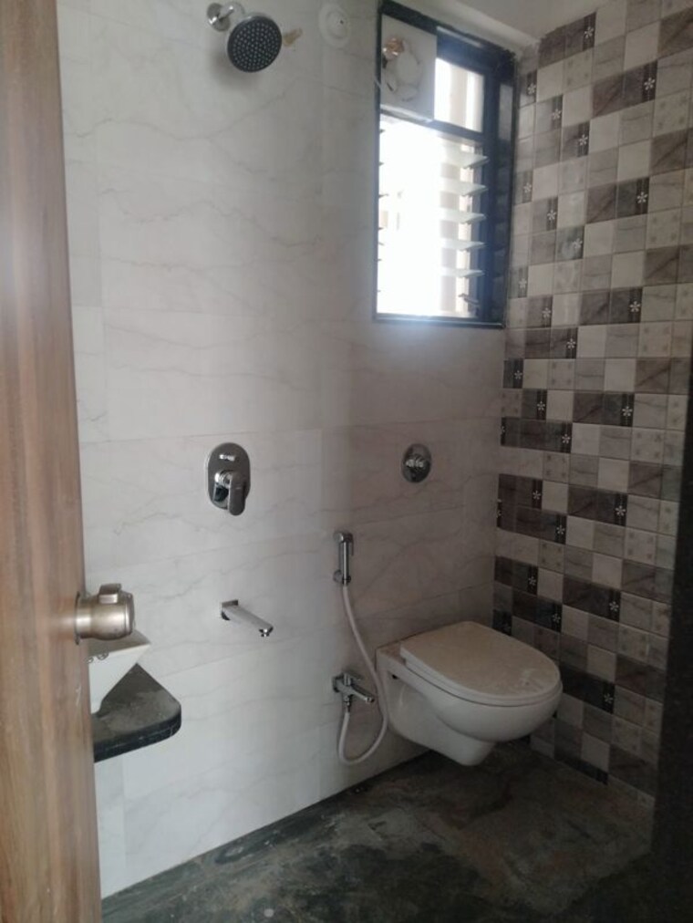 Bathroom, aai-niwas-rahatani 2 Bedroom 780 Sq.Ft. Apartment In Rahatani Pune 10472420