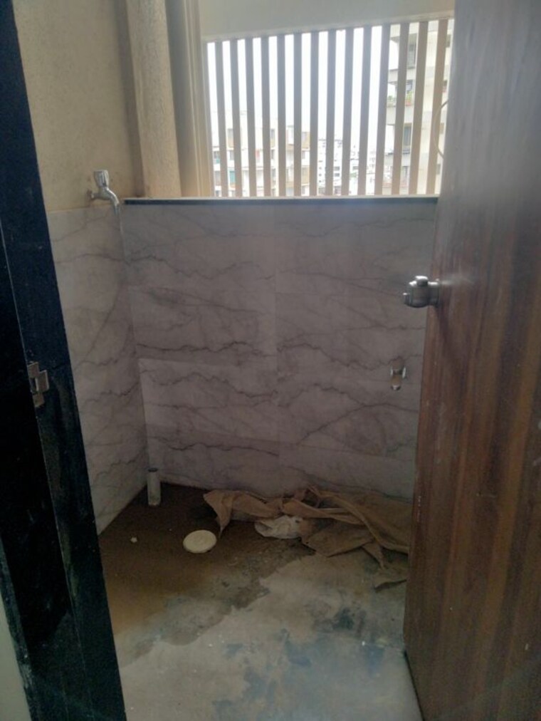 Bathroom, aai-niwas-rahatani 2 Bedroom 780 Sq.Ft. Apartment In Rahatani Pune 10472420