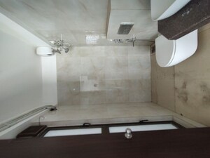Bathroom in 2 BHK Apartment at Raymond Realty Phase II, Pokhran Road No Two – for Rent