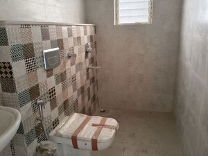Bathroom in 4 BHK Builder Floor at Jodhpur Park – for Sale