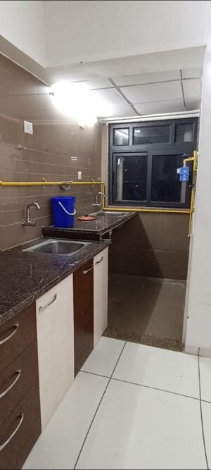 Kitchen in 2 BHK Apartment at Kavisha Amara, Shela – for Rent