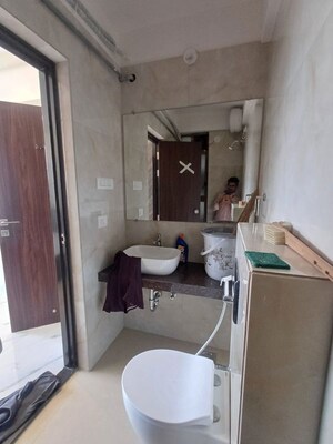 Bathroom in 1 BHK Apartment at Colorplus Raymond Realty Phase I, Pokhran Road No Two – for Rent