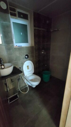 Bathroom in 2 BHK Apartment at Omkar Signet, Malad East – for Rent